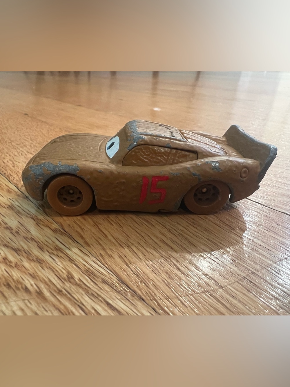a Disney Pixar Cars Lightning McQueen as Chester Whipplefilter die-cast vehicle